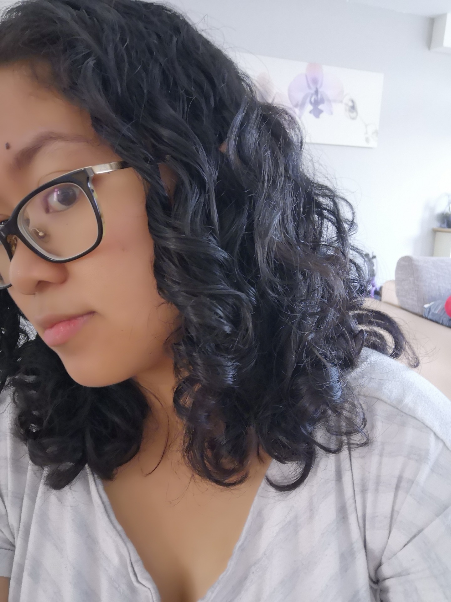 I have more definition, and my hair is not fuzzy at all.